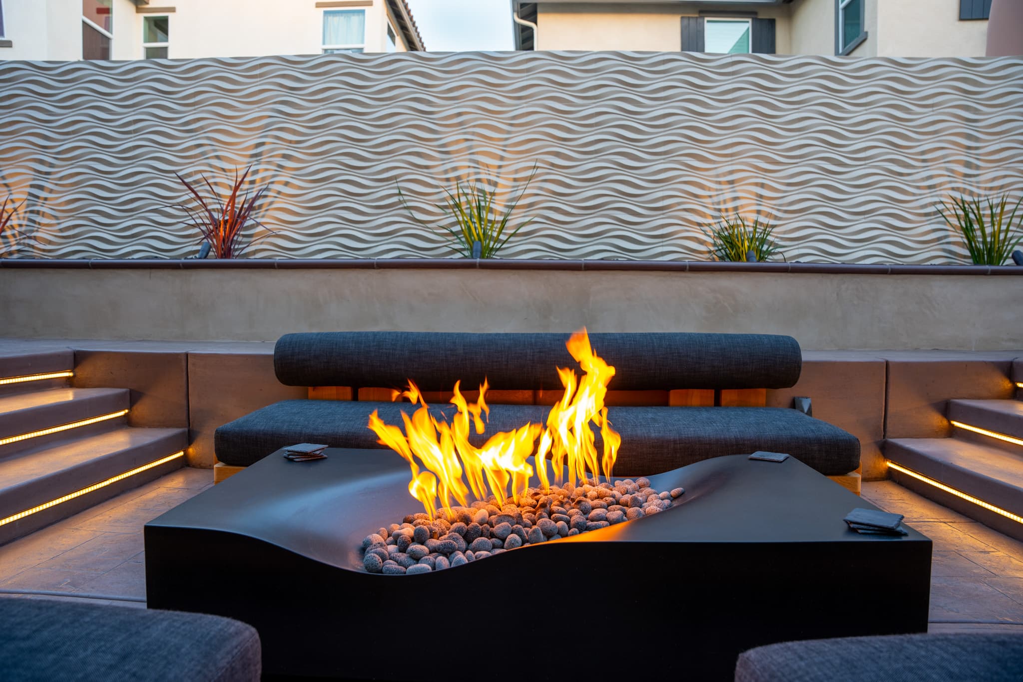 backyard design with fire pit, lounge area, jacuzzi, etc.
