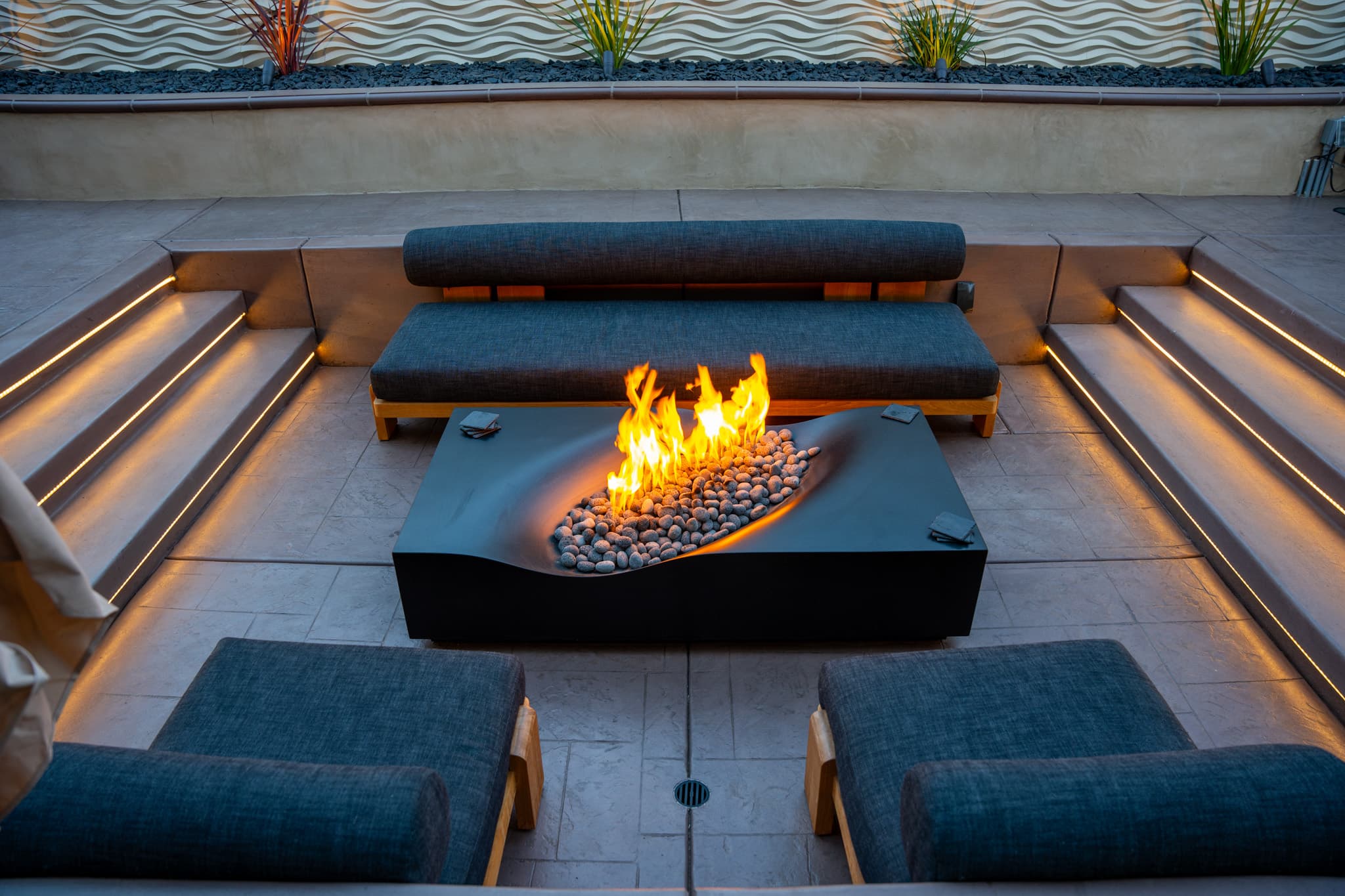 backyard design with fire pit, lounge area, jacuzzi, etc.