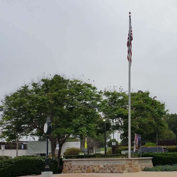 Allied Gardens sign and flag