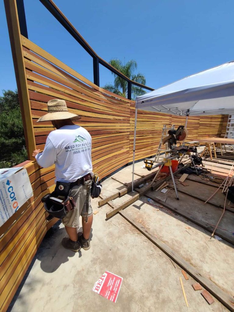 Horizontal Wacood Slat Fence Build In Progress in 92128