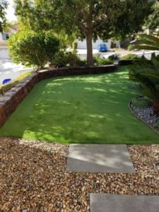 Keystone Wall Dividing Turf and Planter Area of Landscape