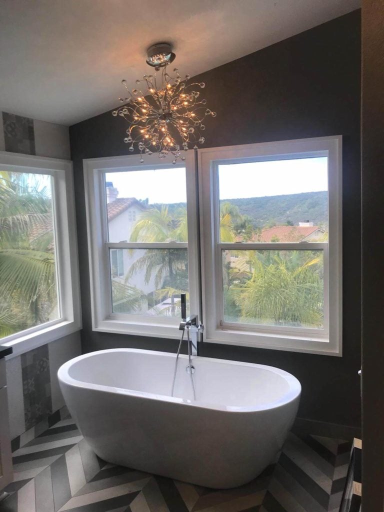 Chandelier over bathtub