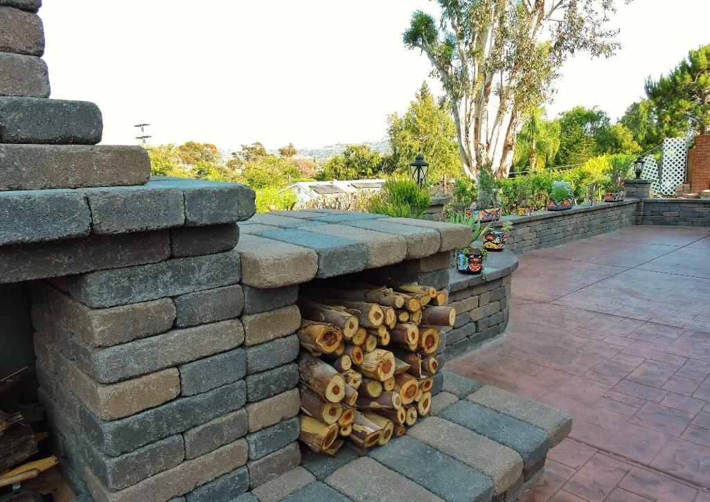 fireplace with stamped concrete and custom garden wall 2