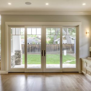 Doorway with Large Windows to Backyard