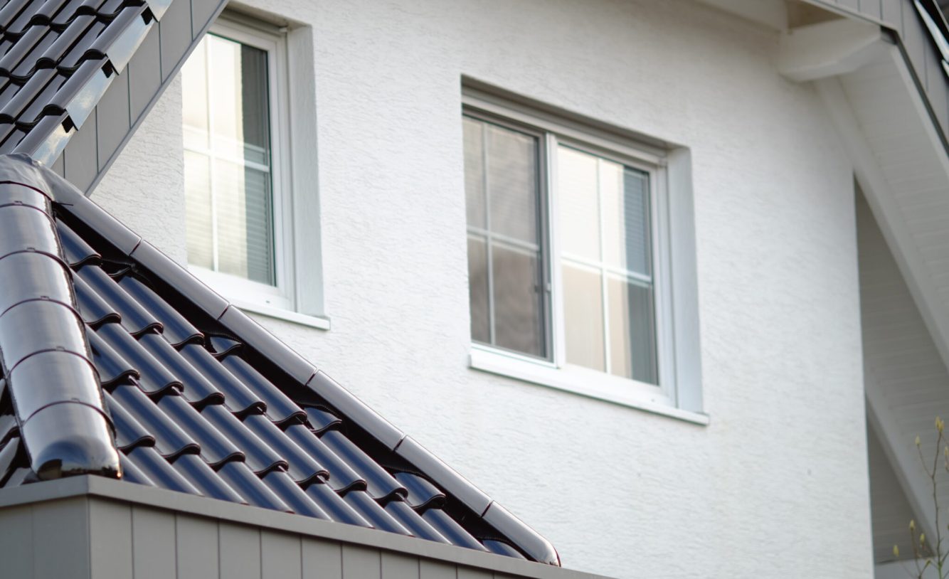 low-angle-shot-white-building-with-two-windows